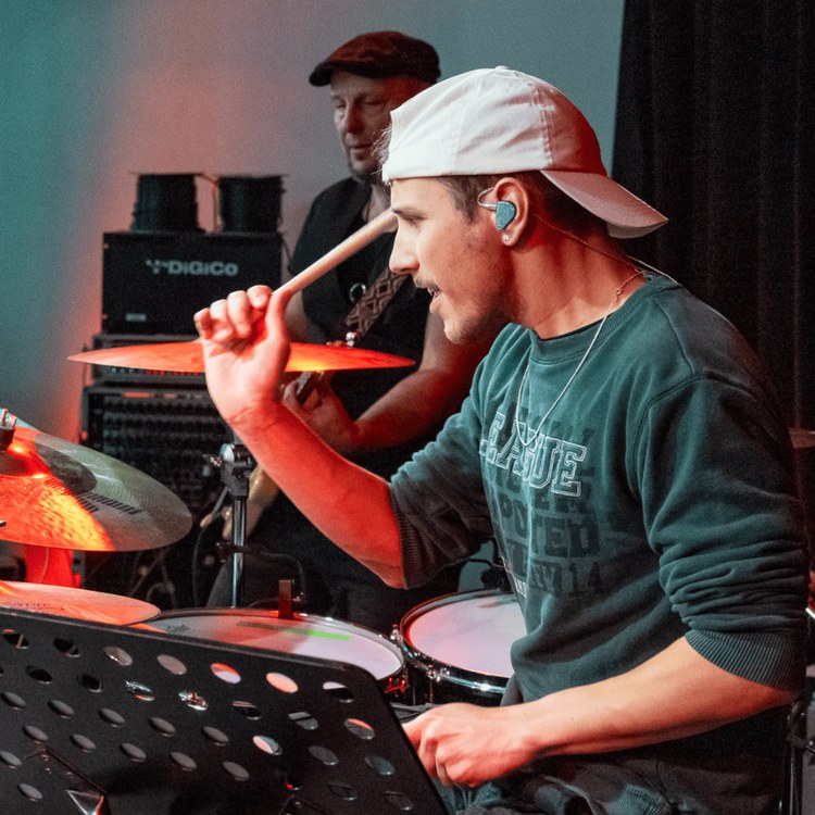Leo Asal performing, wearing Vision Ears in-ear monitors