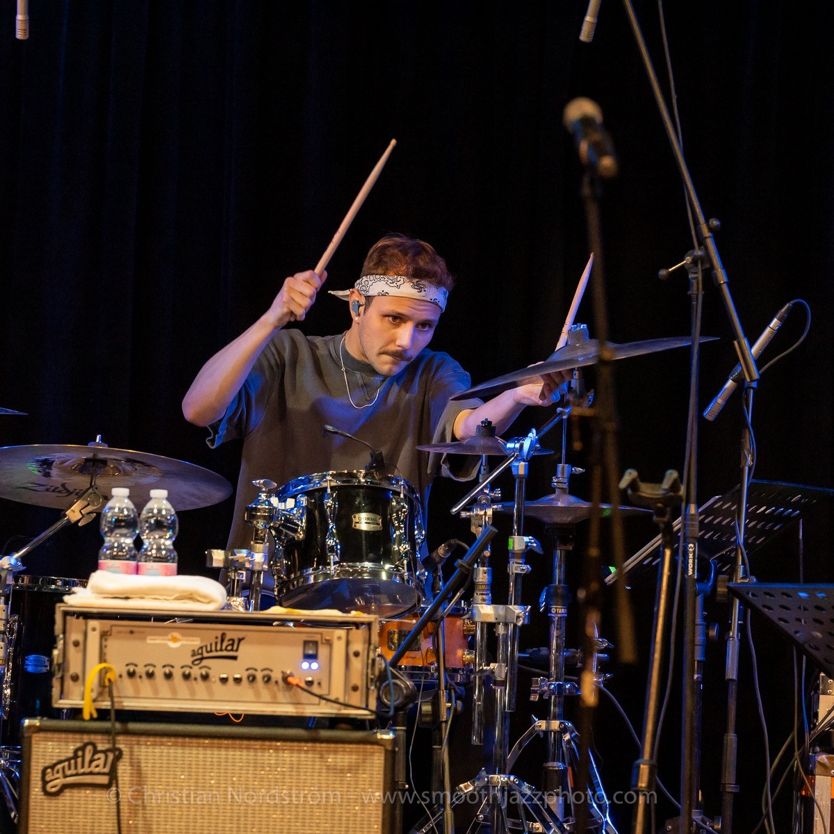 Leo Asal performing, wearing Vision Ears in-ear monitors