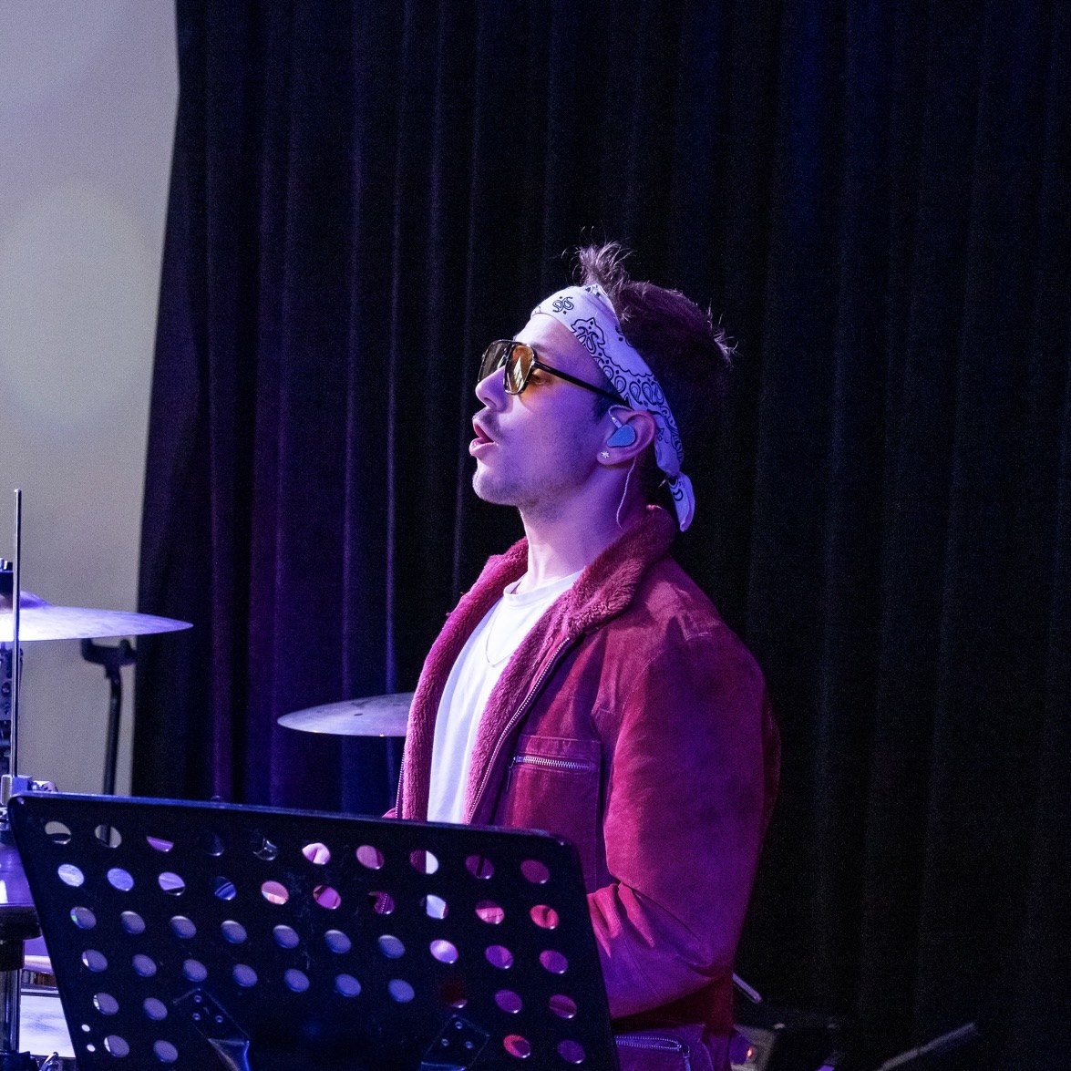 Leo Asal performing, wearing Vision Ears in-ear monitors
