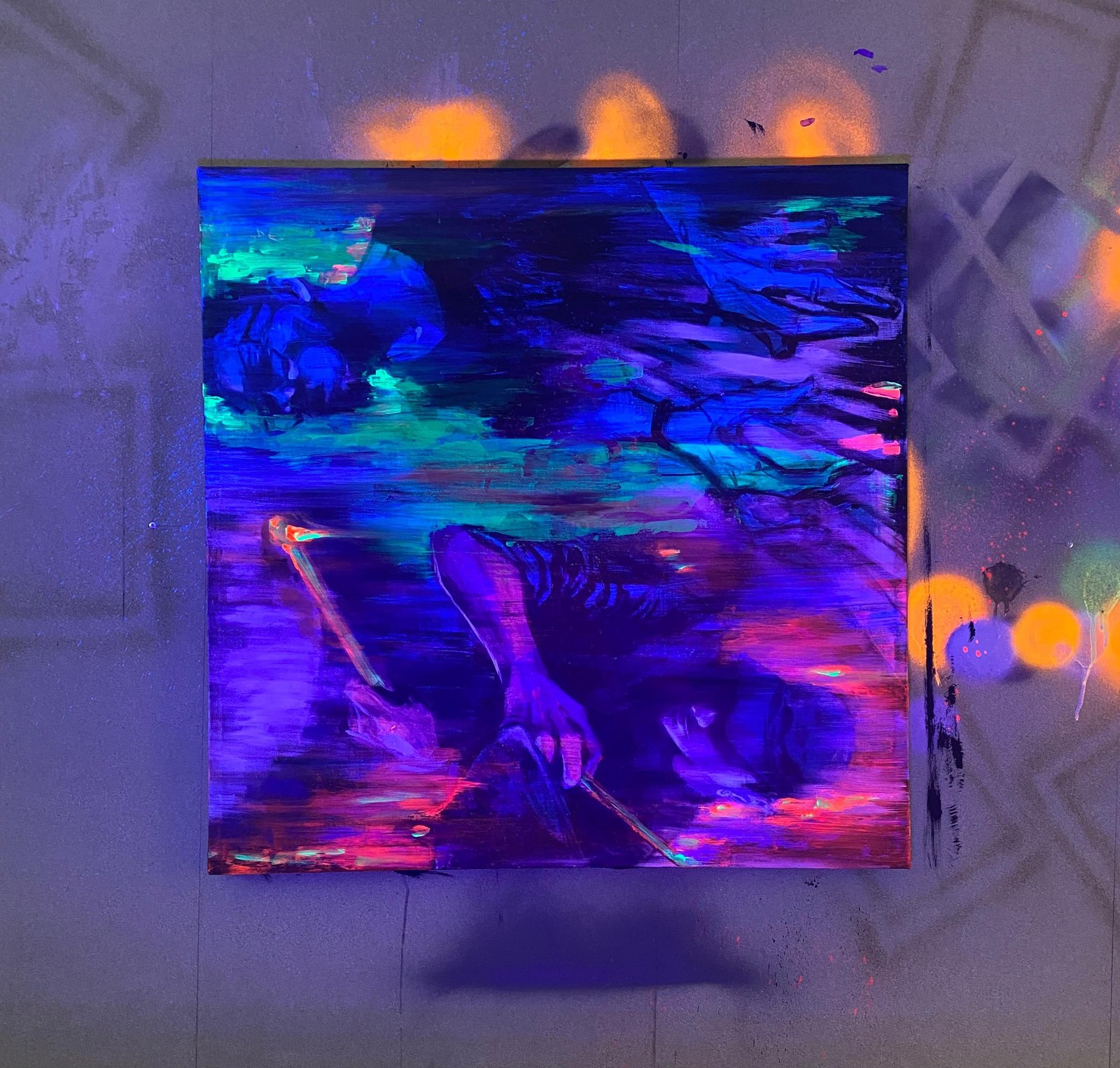 The painting photographed under blacklight